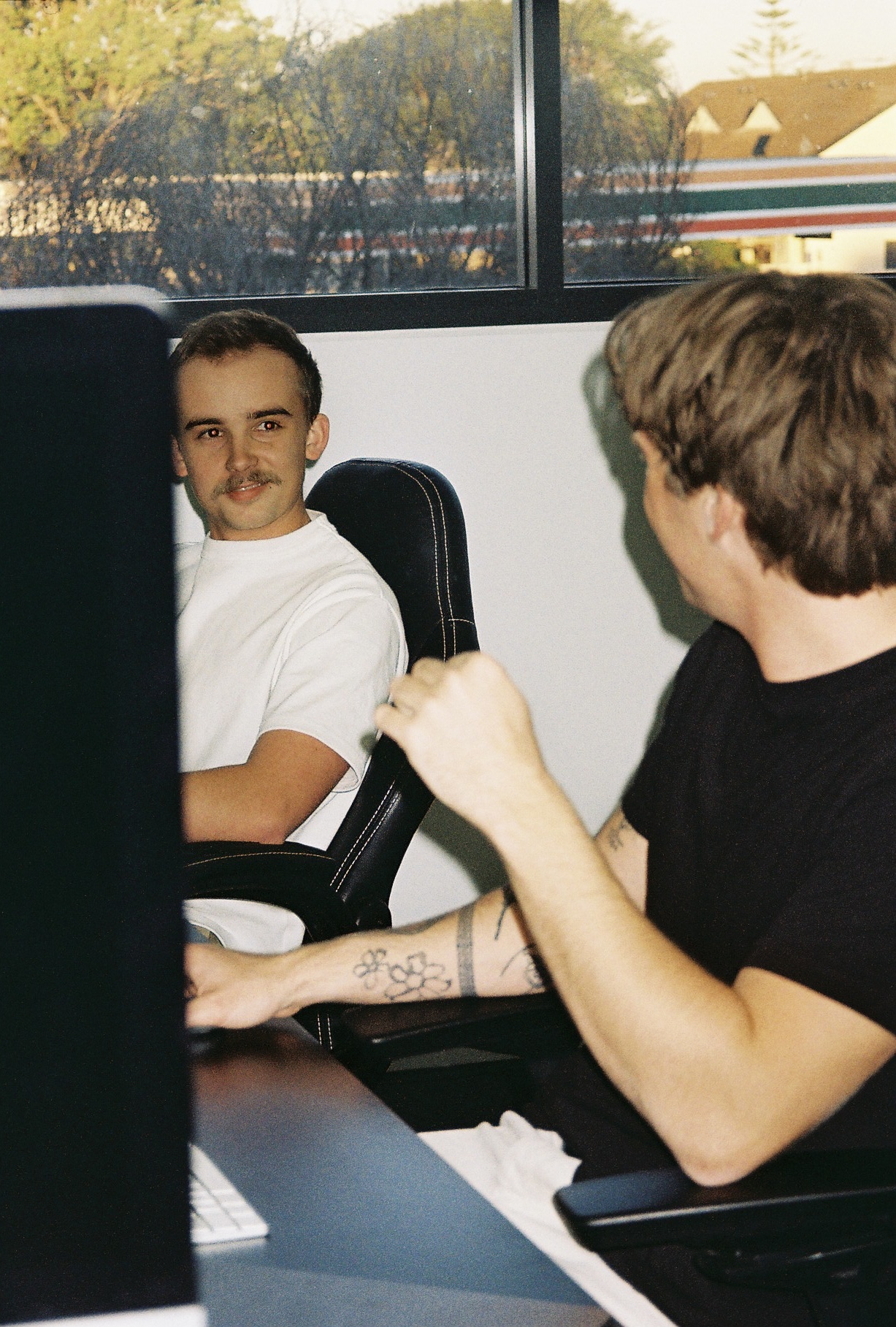 Ryan and Oliver at the Helm desk in Newcastle